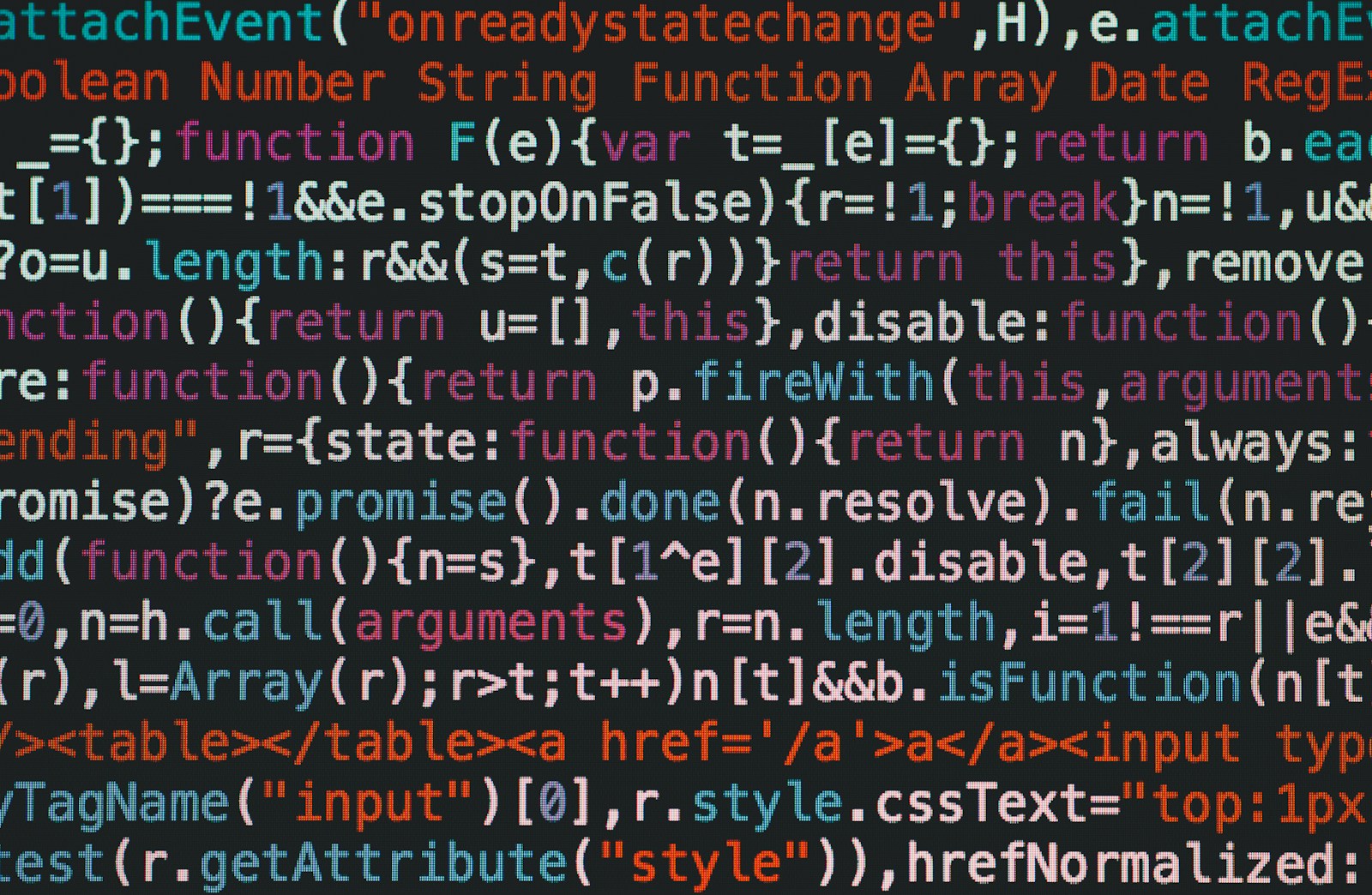Colorful JavaScript code on a dark screen